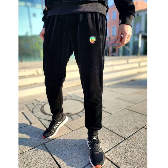 Spodnie dresowe, welurowe, czarne z aplikacją w barwach Rasta